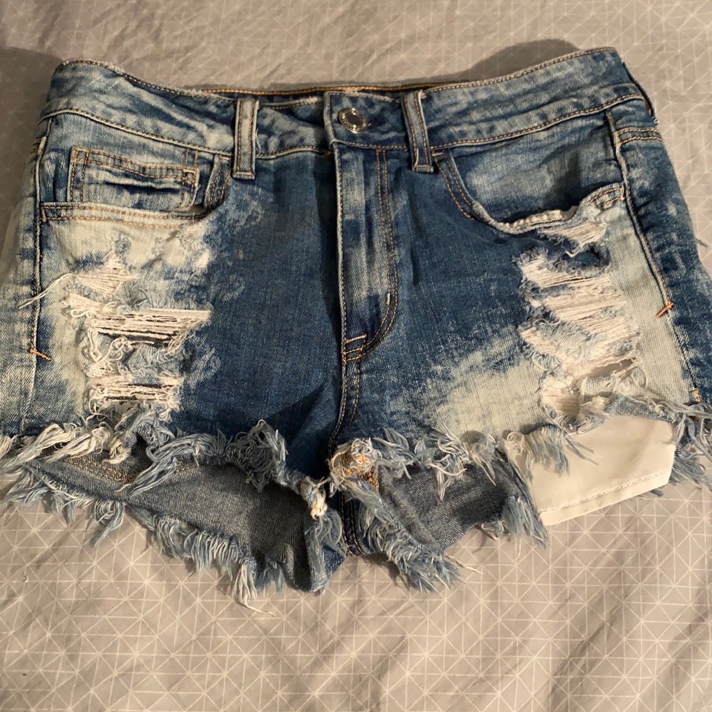 American Eagle Outfitters super distressed denim shorts